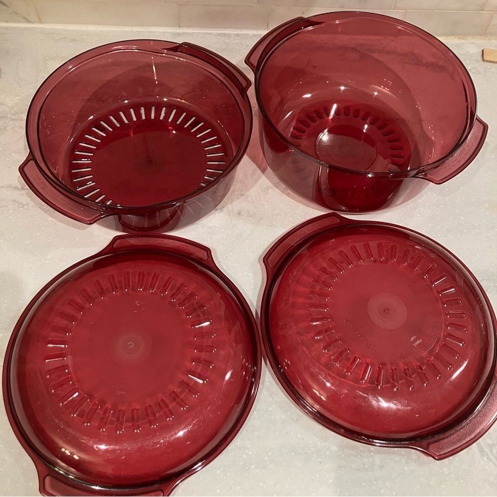 Tupperware 4 piece burgundy microwave cooker/steamer with lids. EUC